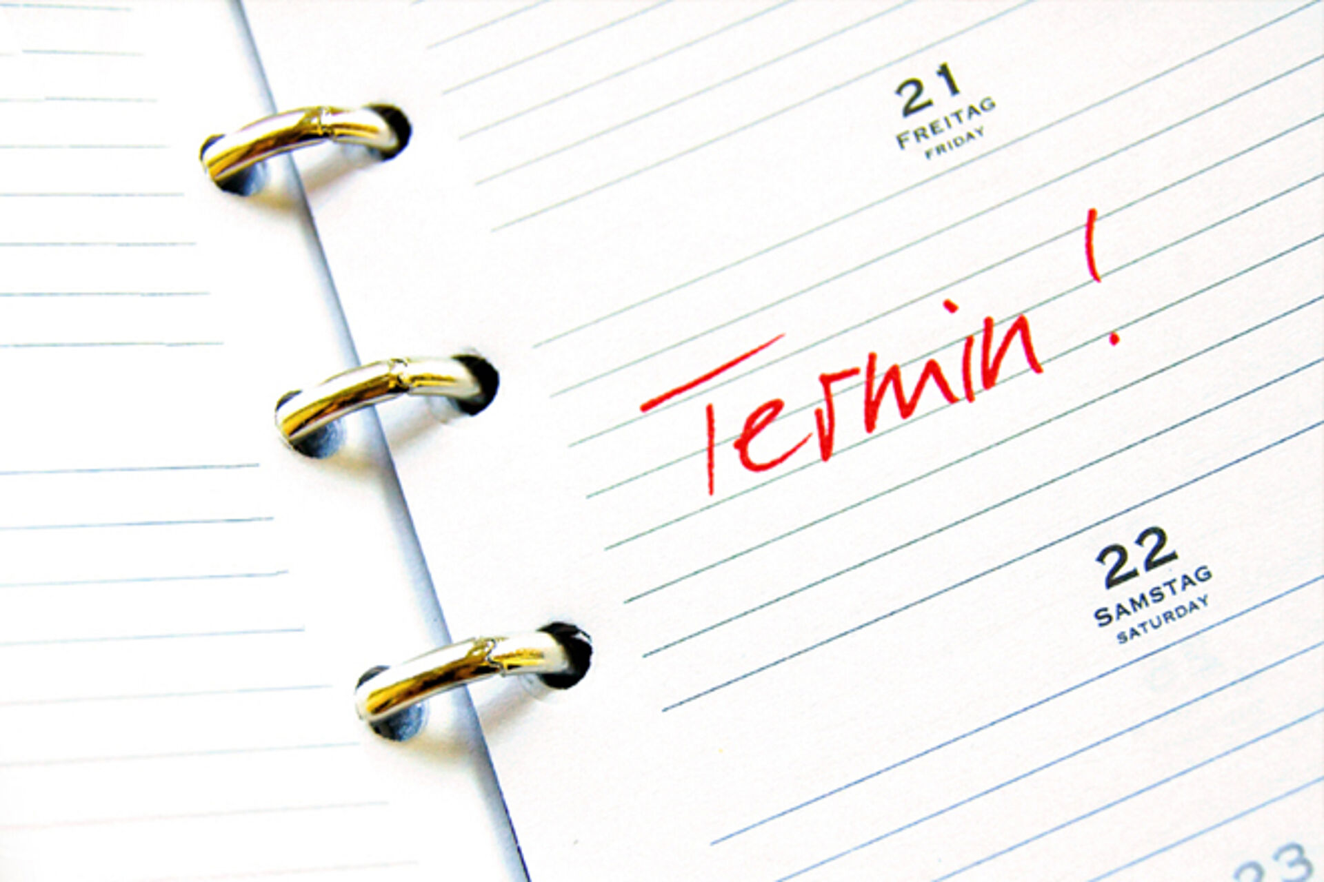 Dekofoto: Seite eines Wochenkalenders mit Schriftzug Termin!